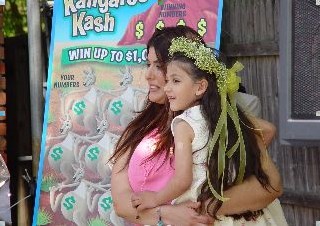 Single Mom Hopping With Joy Over Kangaroo Kash Instant Game -